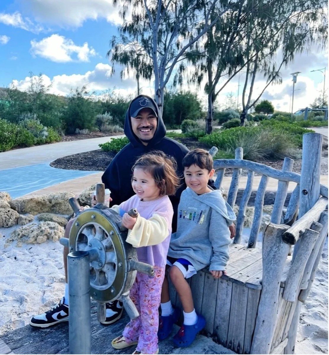 Founder Steven Henry with his two children at a Yanchep beach playground
